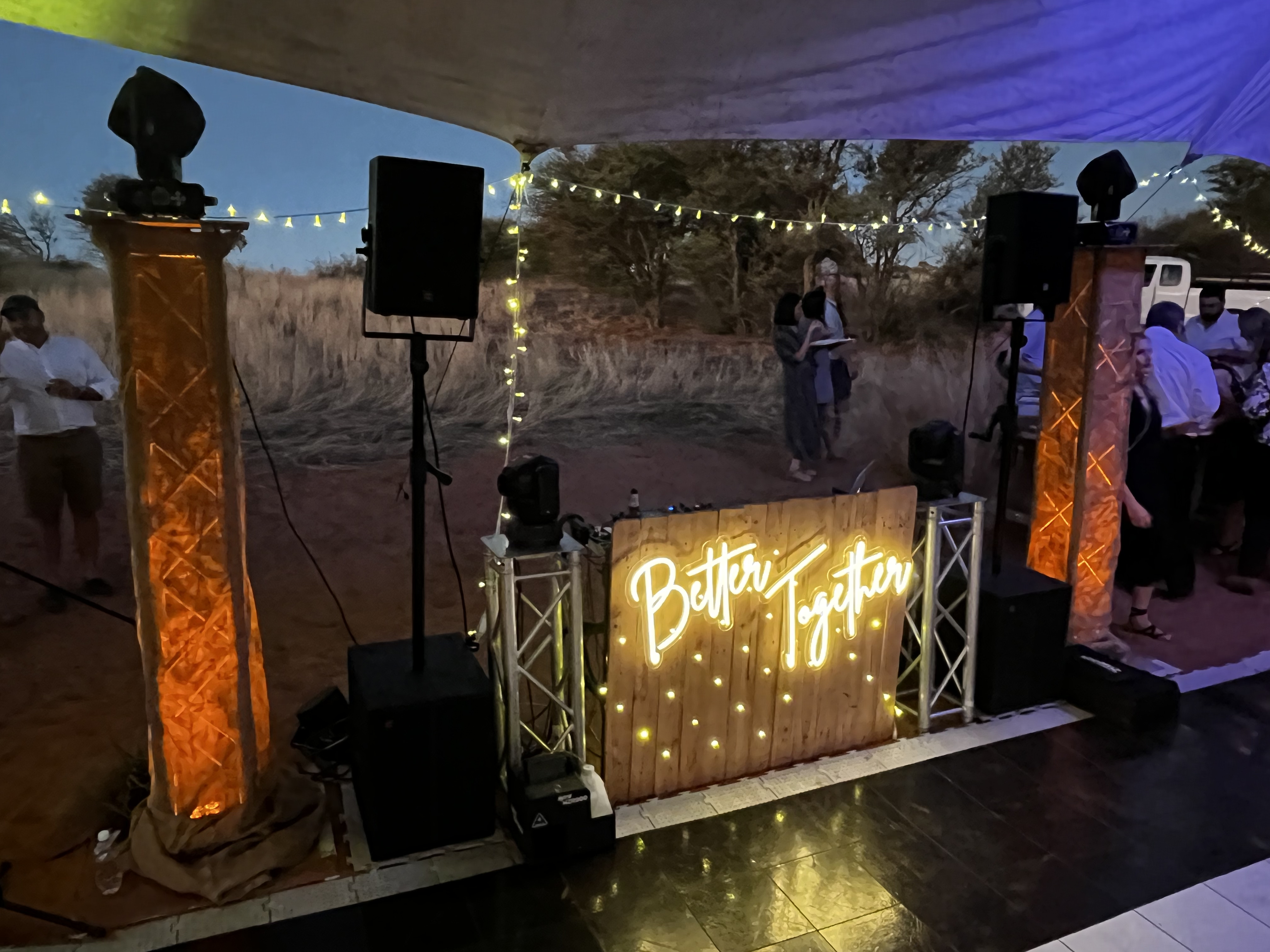 Wedding DJ booth with lighting and speakers