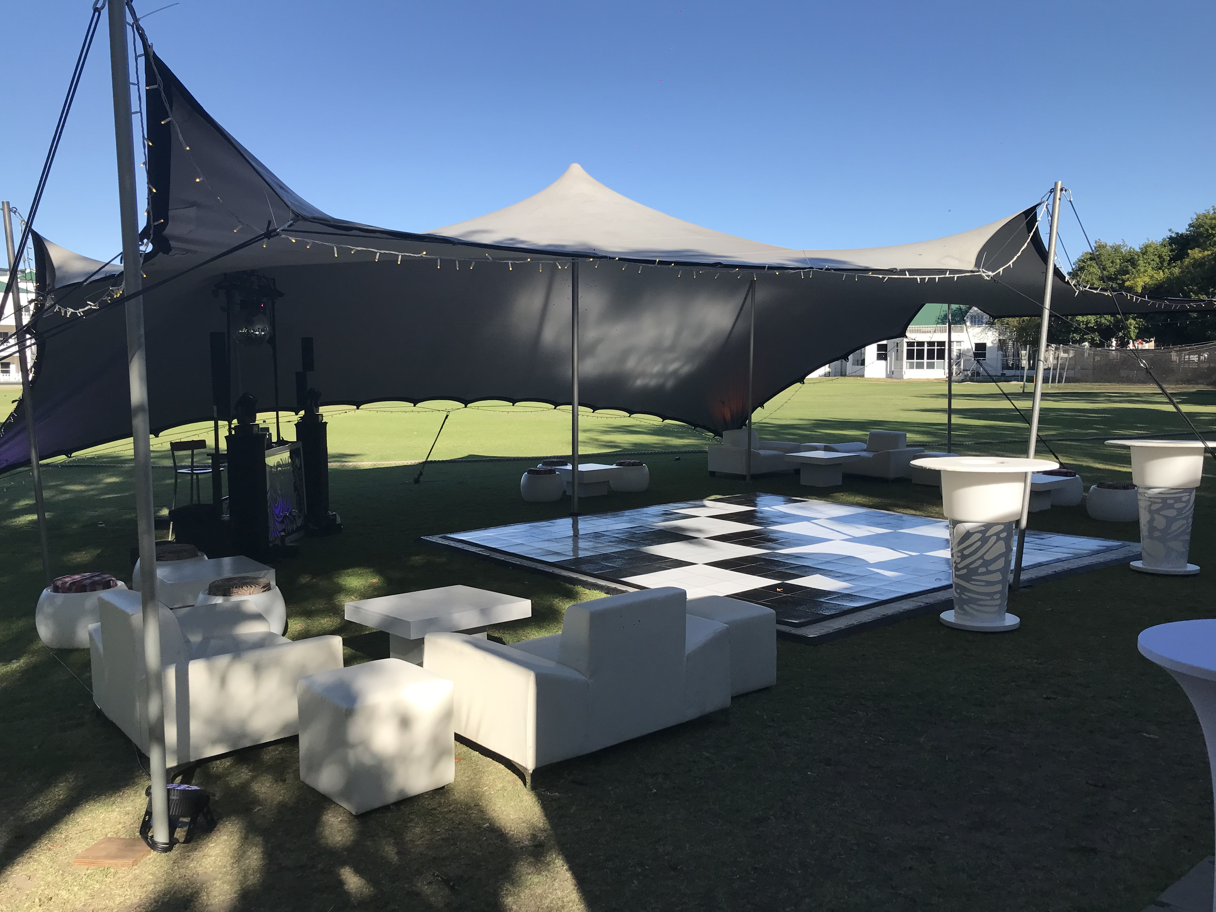 Guests celebrating around a styled dance floor